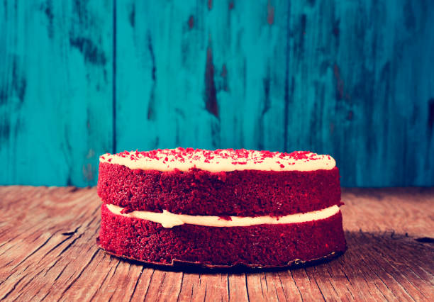istock red velvet cake on a wooden table, filtered 1271129327