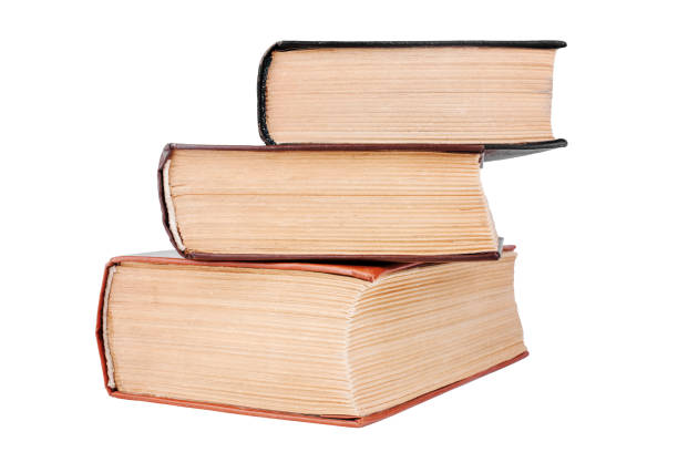 istock Three closed old thick paper books with yellow pages white background isolated close up, book heap, pile, stack, vintage hardcover textbooks, education symbol, read & study sign, library literature 1271129498