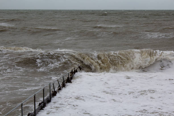 istock Rough sea waves and sea foam 1271134278