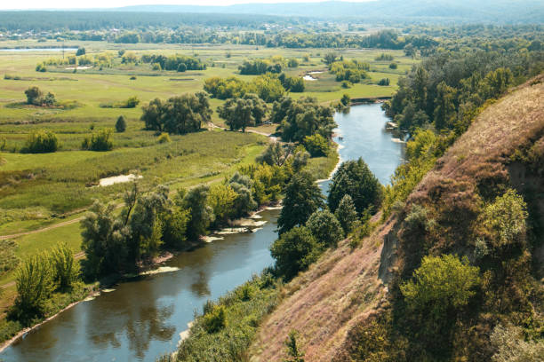 istock Summer rural scenery on river valley from hill 1271134393