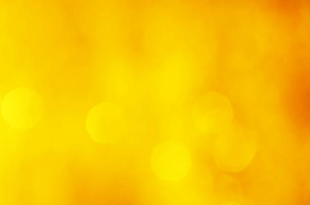 istock glitter light sparkle yellow golden gorgeous bokeh defocused abstract background shiny. 1271134422