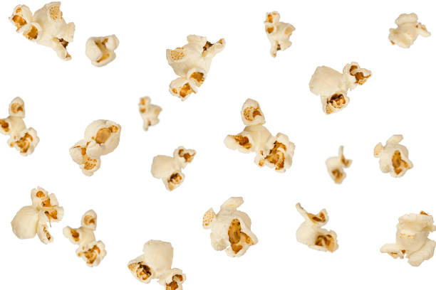 istock Falling popcorn are isolated on a white background with clipping path as package design element and advertising 1271137653