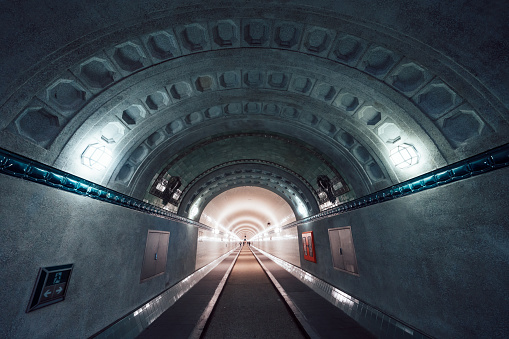 inside view of illuminated old Elbtunnel in Hamburg