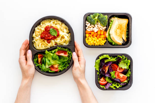 istock Delivery containers with takeout food on table. View from above 1271140398