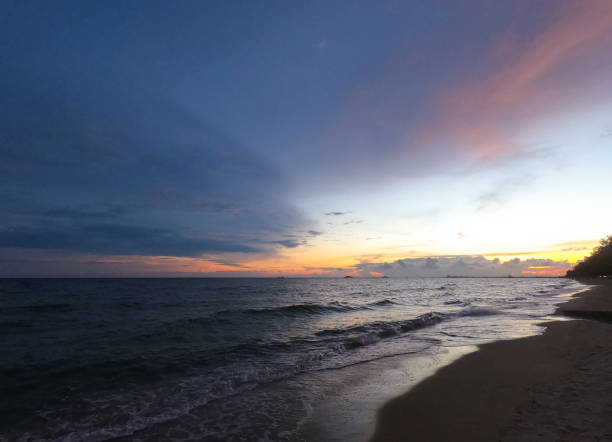 istock Beautiful sunset blurred background at Rayong beach 1271140526