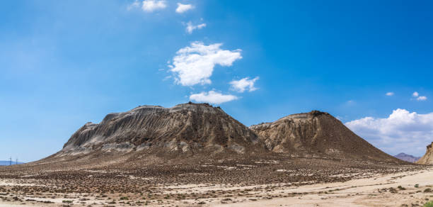 Clouds over rocks in a desert area