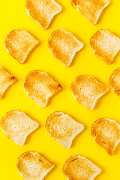 istock Slices of toast bread pattern. Food background. Top view 1271145151