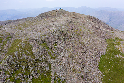 Aerial view of walkers on top of Scafell Pike - England's tallest mountain