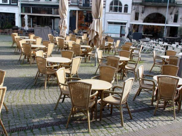 istock Empty Outdoor Restaurant Chairs Due To COVID-19 1271148250