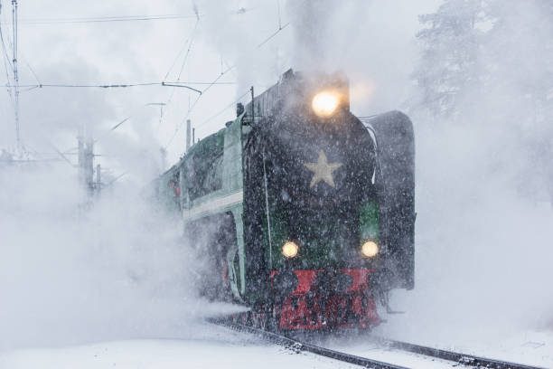 istock Retro steam train departs from the railway station. 1271148794
