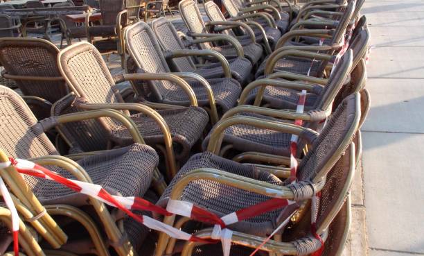 istock Stacked Restaurant Chairs Due To COVID-19 Lockdown 1271148832