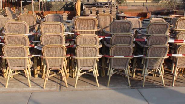 istock Restaurant Chairs Stacked Because Of COVID-19 Quarantine 1271148870