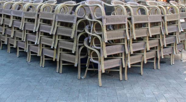 istock Restaurant Chairs Stacked Due To COVID-19 Quarantine 1271148884