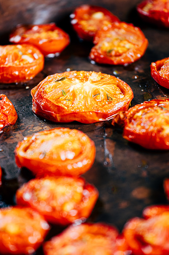 Roasted sliced tomatoes seasoned with garlic, basil and thyme.