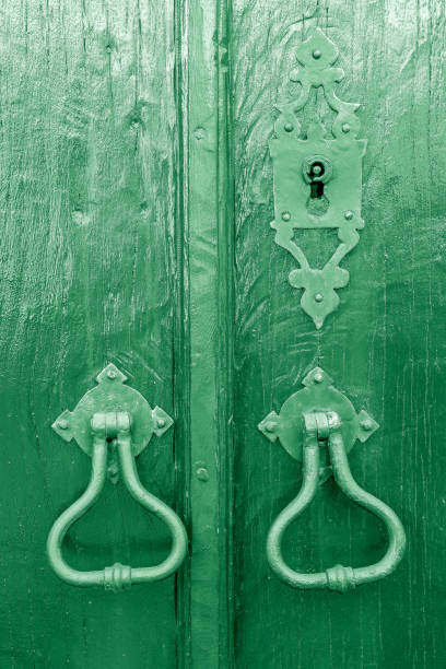 istock antique door lock of rectangular shape painted green. 1271150398