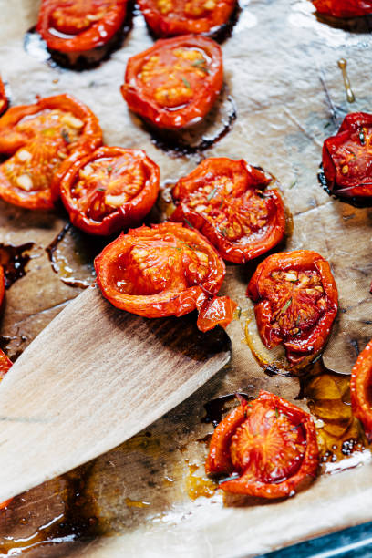 istock Roasted tomatoes just out from the oven 1271150461