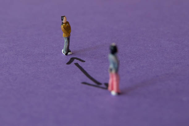 istock Group of miniature people with distance between them 1271150574