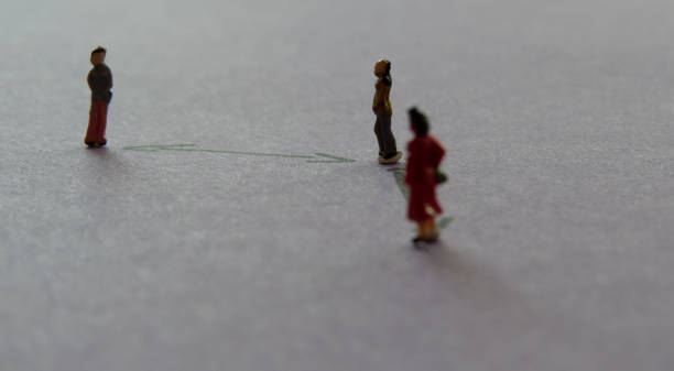 istock Group of miniature people with distance between them 1271150588
