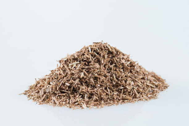 istock Pile of wood smoking chips isolated on white. 1271151871
