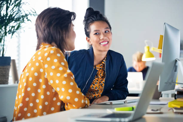istock Female business executives working in new office 1271154723