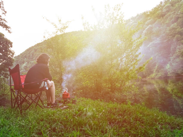 istock Woman camping in nature 1271156628