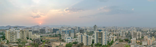 istock Sunset in a fast growing city with tall buildings. 1271157979