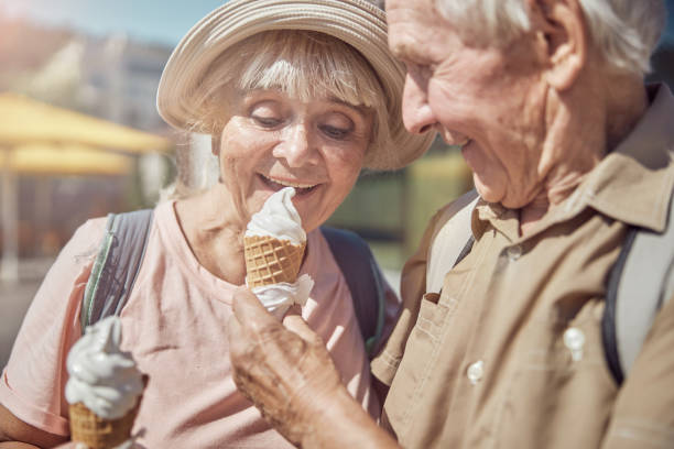 istock Loving spouse feeding his wife with dessert 1271158108