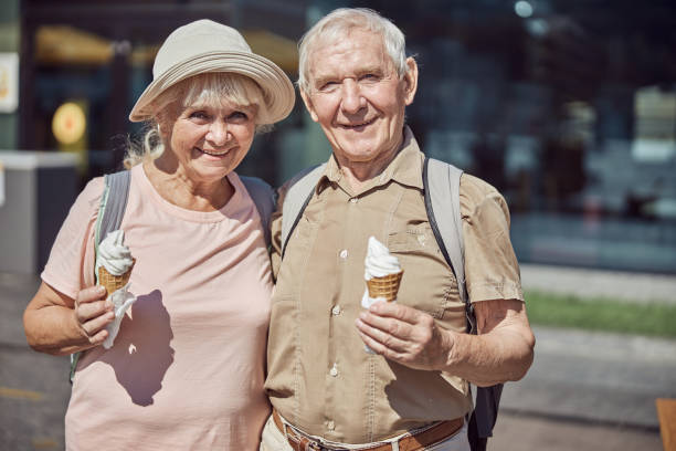 istock Two smiling travelers posing for the camera 1271158115