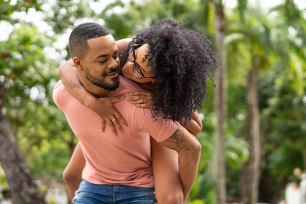 istock Loving couple playing outdoors 1271165552