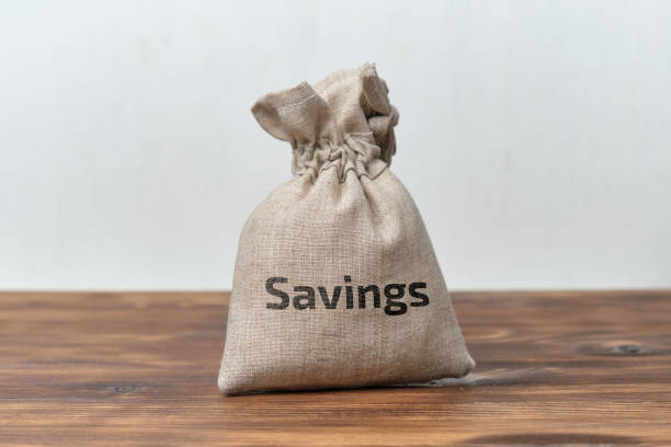 istock Money savings concept in a cloth bag 1271165897