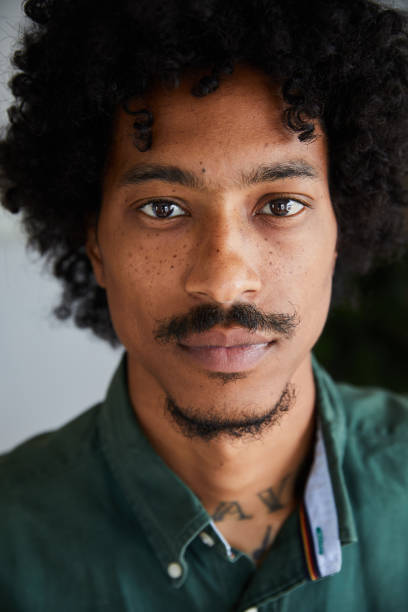 istock Young man with tattoos on his neck 1271168454