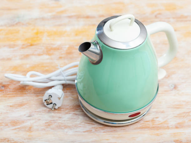 istock Image of new teapot on table in home interior 1271170318