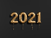 New year 2021 gold and black. Gold foil balloons numeral 2021 isolated on black background. 3D rendering