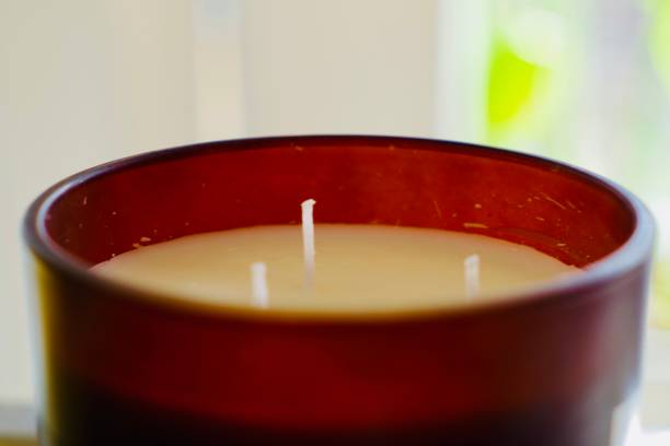 istock Close up of large candle with three wicks 1271175816