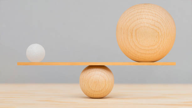 equilibrio e armonia con diverse palle - large and small foto e immagini stock