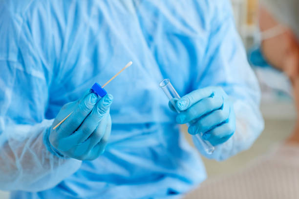 istock Medical Worker Holding Swab Test Stick 1271178784