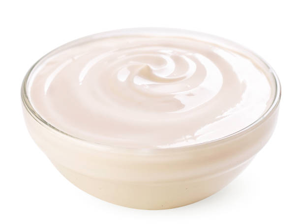 istock Sour cream in a glass plate on a white background. Isolated 1271178798