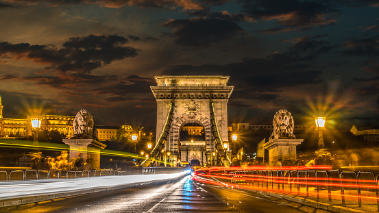 Illuminated Chain Bridge in Budapest at sunset