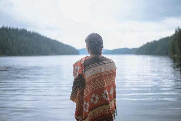 istock Woman Is Looking At The View Wearing A Beautiful Boho Chick Style Scarf 1271180982