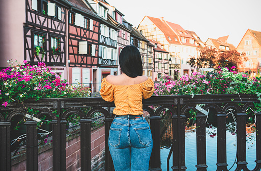 Young tourist female enjoying in Colmar France.