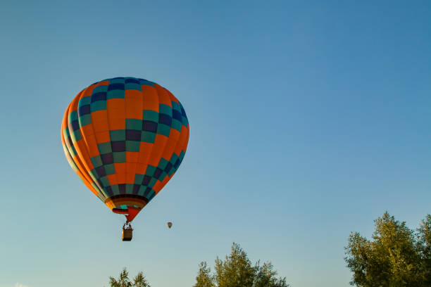 istock hot air balloon in blue sky 1271181219