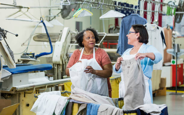 istock Two senior women working at dry cleaners 1271183314