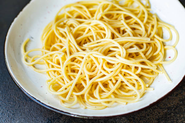 istock spaghetti pasta plate macaroni semola durum wheat on the table serving portion size top view place copy space for text 1271183461
