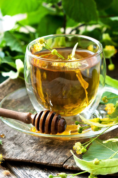 istock Herbal linden tea in glass cup, selective focus 1271183641