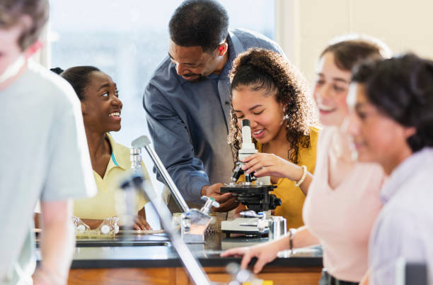 istock African-American man teaching high school science lab 1271186432