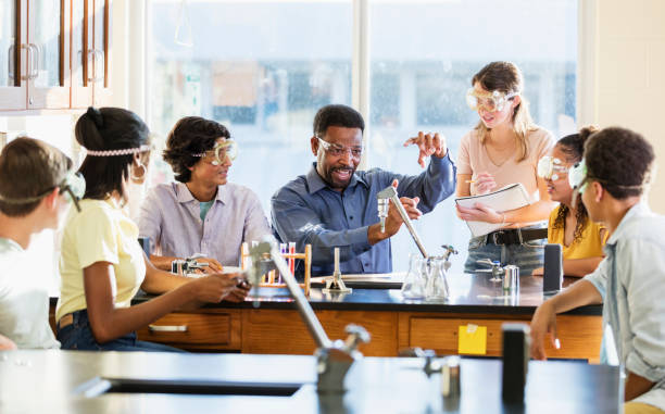 istock African-American man teaching high school chemistry lab 1271186481