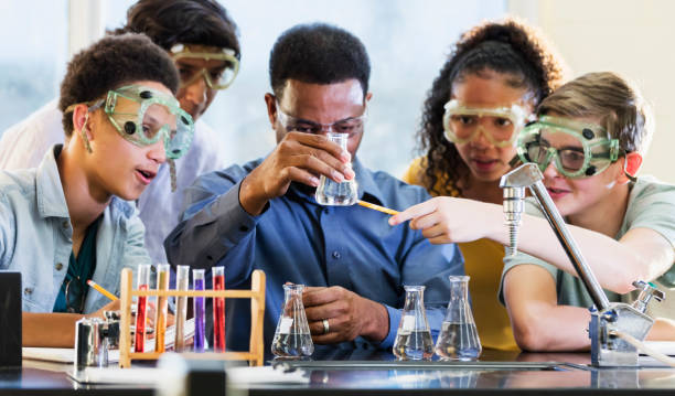istock African-American man teaching high school chemistry lab 1271186506