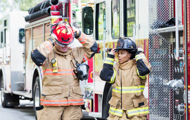 istock Firefighters in fire protection suits ready for action 1271192462