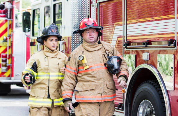 istock Firefighters in fire protection suits ready for action 1271192467