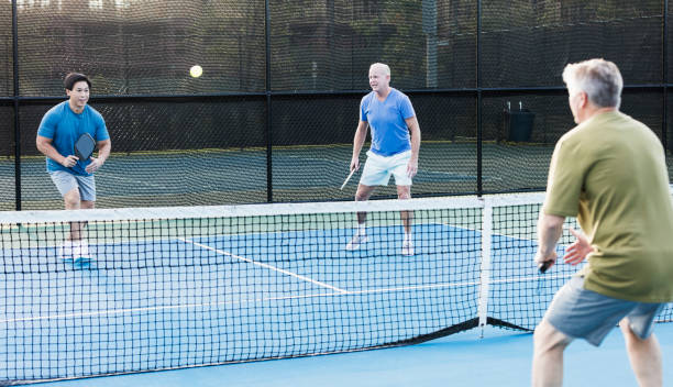 istock Men playing pickleball outdoors 1271192992